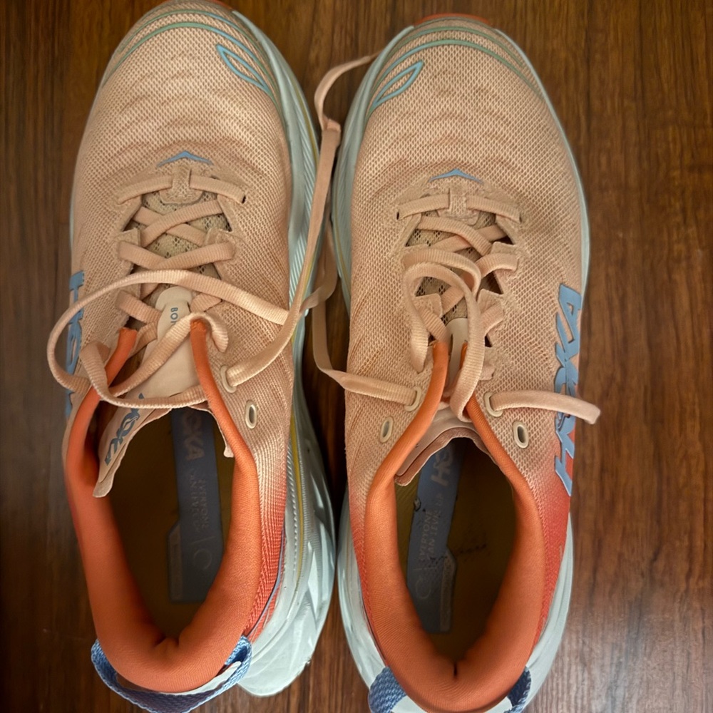 Hoka Bondi X running shoes in the "Camellia Peach Parfait"